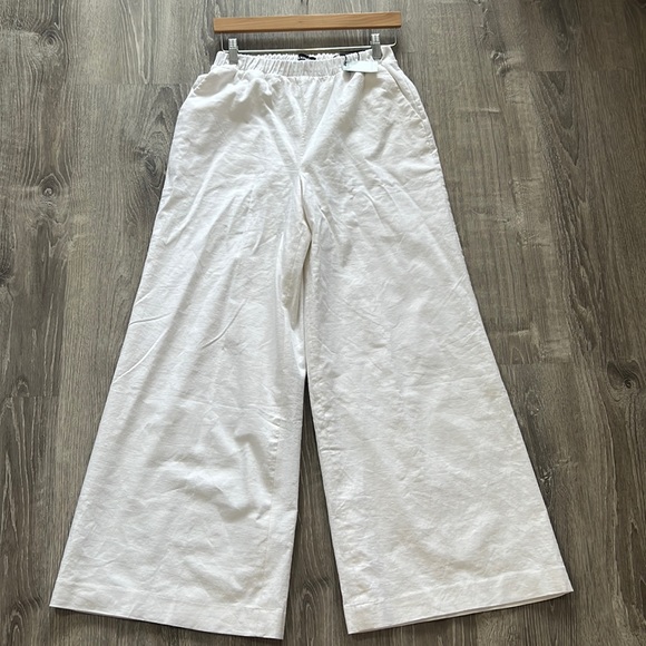 Express Pants - White Wide leg super high rice pants .